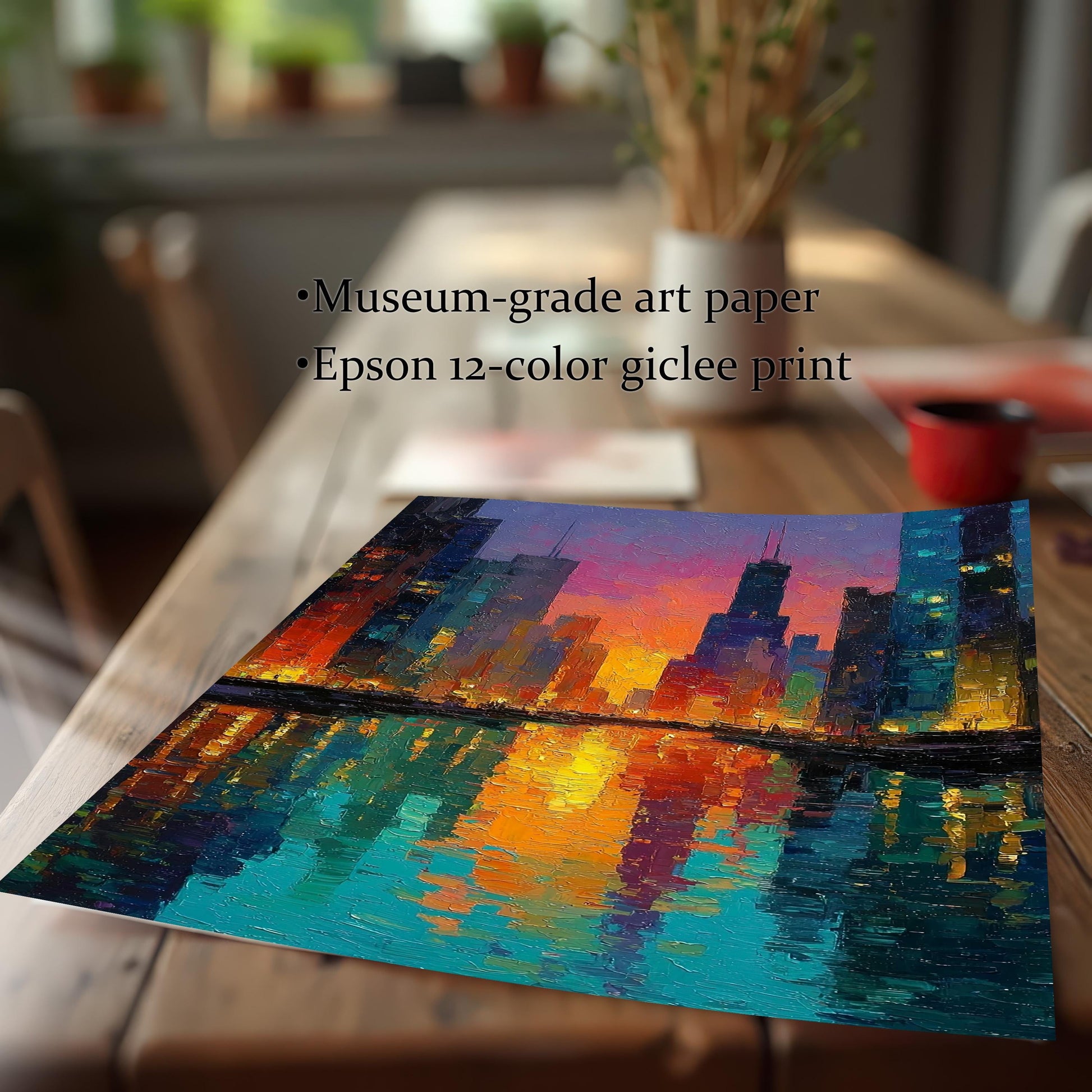 Close-up of an unframed Epson 12-color giclee art print of a colorful cityscape painting, emphasizing the museum-grade art paper quality. The print is leaning on a rustic wooden table with a blurred home interior background.