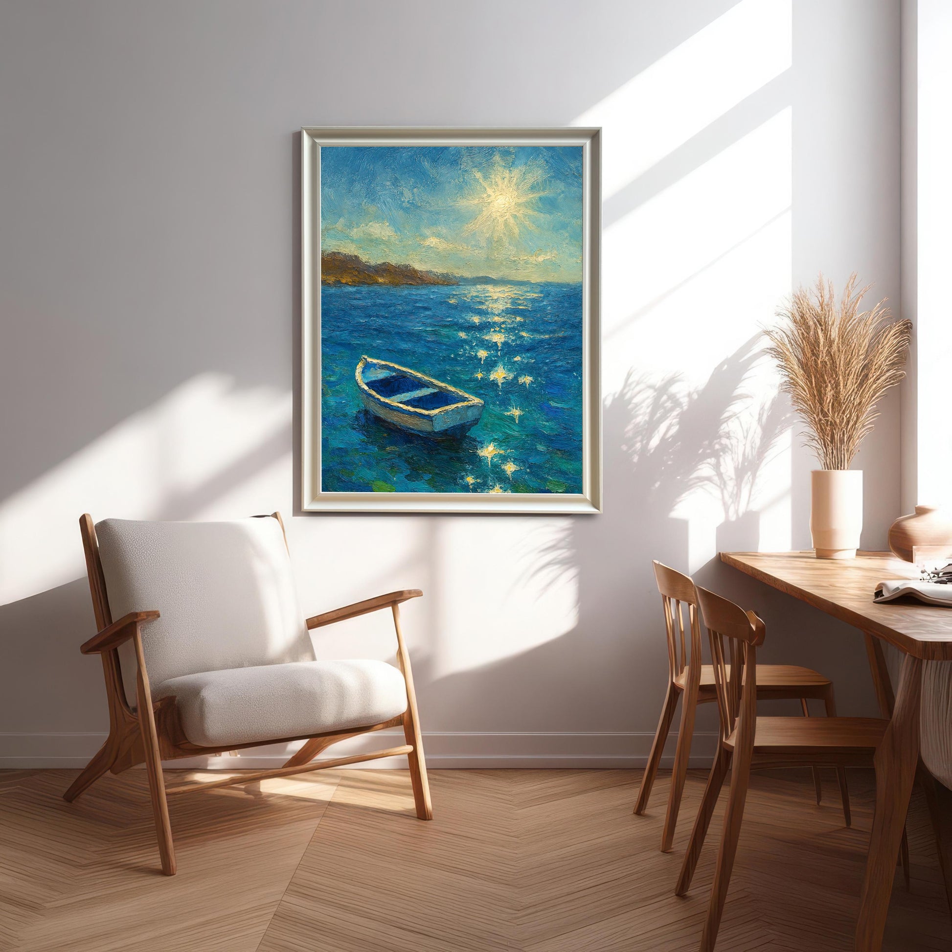 A framed print of the boat painting in a White/Silver frame hanging on a wall in a bright, modern living space next to a wooden armchair and dining table.