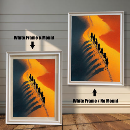 Dramatic desert art print featuring a camel caravan silhouette, shown in a White Frame. Comparison shot: White Frame & Mount (with white border/mat) on the left, and White Frame / No Mount (without border/mat) on the right.