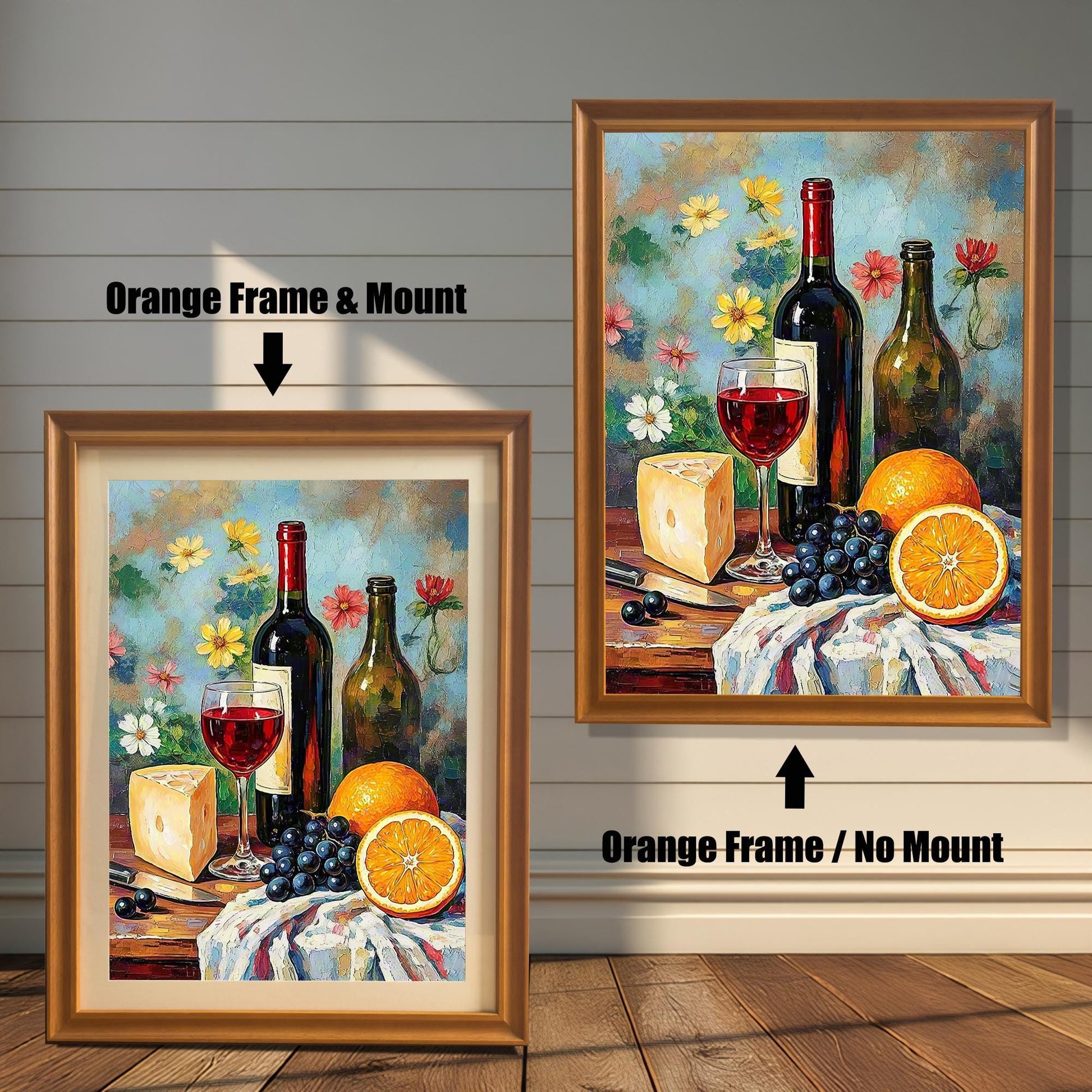 Comparison image showing the art print framed in an Orange Frame / No Mount (right) and an Orange Frame & Mount (left). The print features a still life with wine, cheese, grapes, and oranges against a floral background.