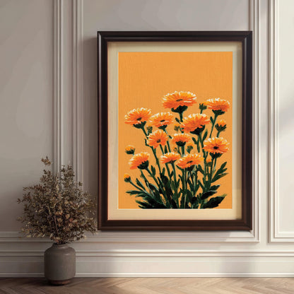A portrait-oriented orange floral art print in a Coffee wood frame with a mount (matting) leaning against a paneled white wall next to a dried flower arrangement in a vase.