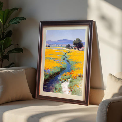 Framed art print (Coffee Frame with Mount) leaning against a cream-colored wall, resting on a beige sofa, bathed in dramatic sunlight and shadow. A potted plant is visible on the left.