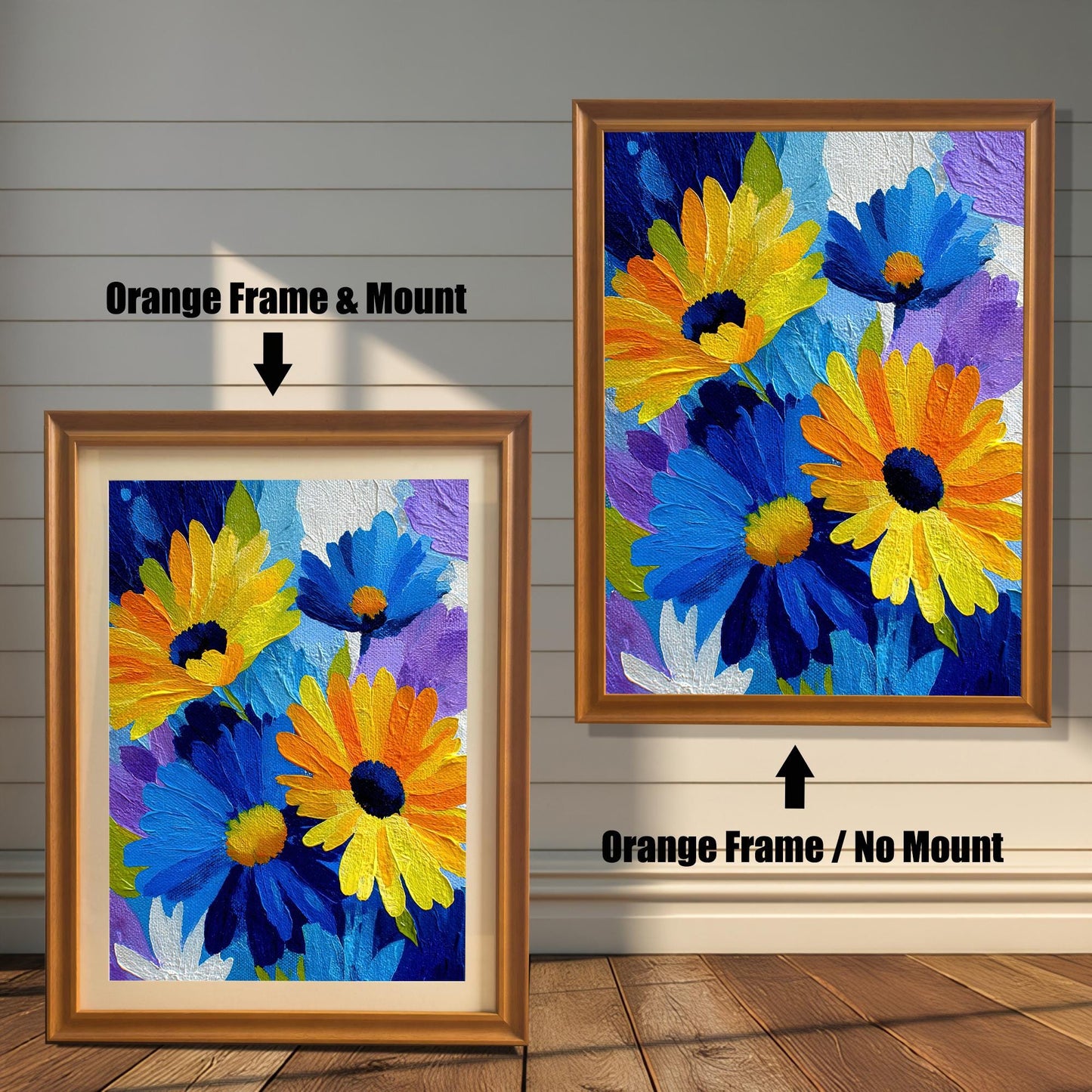 Abstract Blue and Yellow Daisy painting print in two orange wood frames on a rustic wall. The left frame includes a mount/mat, and the right frame shows the print without a mount/mat.