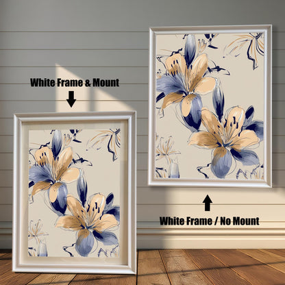 Modern framed print of Navy Blue and Peach/Gold Lilies on a beige background, shown in two white wood frames. The left frame includes a mount/mat, and the right frame shows the print without a mount/mat.