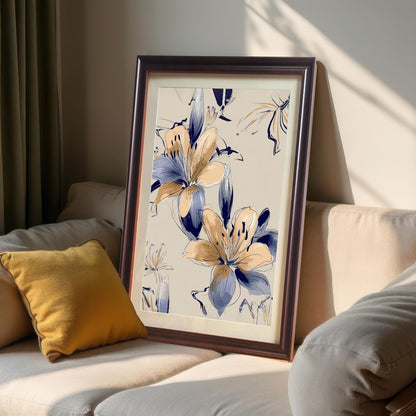 Framed print of the Navy Blue and Peach Floral artwork in a coffee (dark brown) wood frame with a mat/mount, resting on a beige sofa next to a yellow pillow.