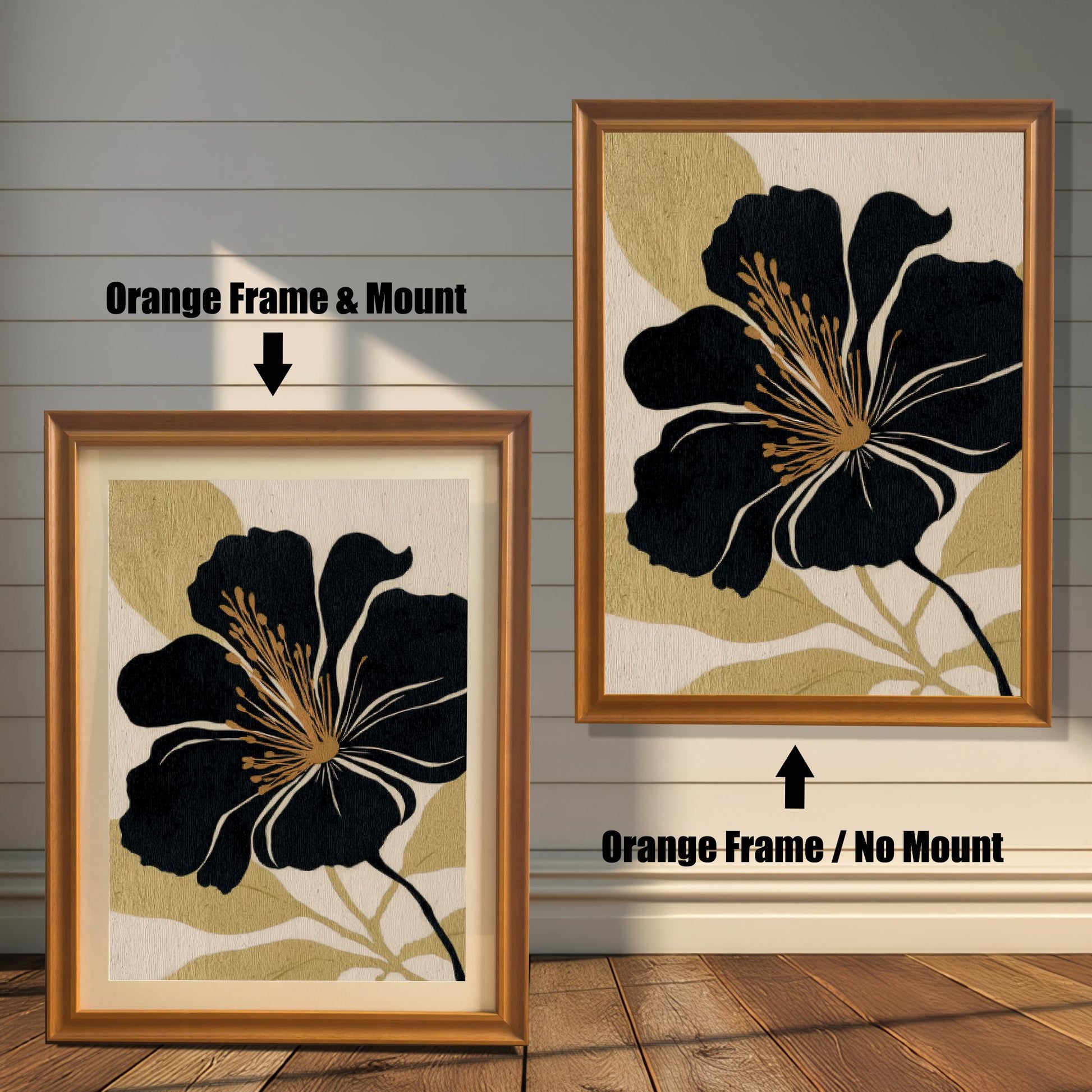 A comparison of two black and gold floral prints against a white wood-paneled wall: one in an Orange Frame & Mount (matting), and the other in an Orange Frame / No Mount (no matting).