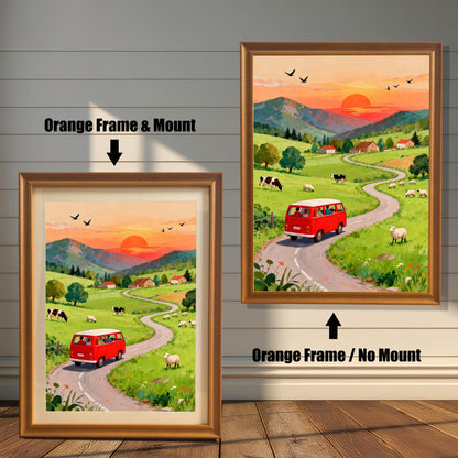 A comparison of two art prints featuring a red camper van on a winding road in a sunset countryside scene. One shows an Orange Frame & Mount (matting), and the other shows an Orange Frame / No Mount.