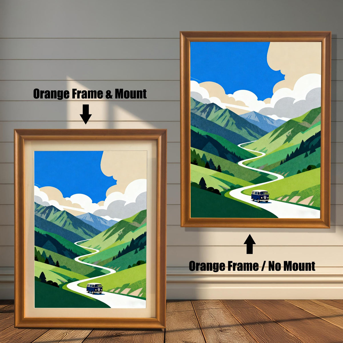 A comparison of two framed art prints of the mountain road trip scene. One shows an Orange Frame & Mount (matting), and the other shows an Orange Frame / No Mount.