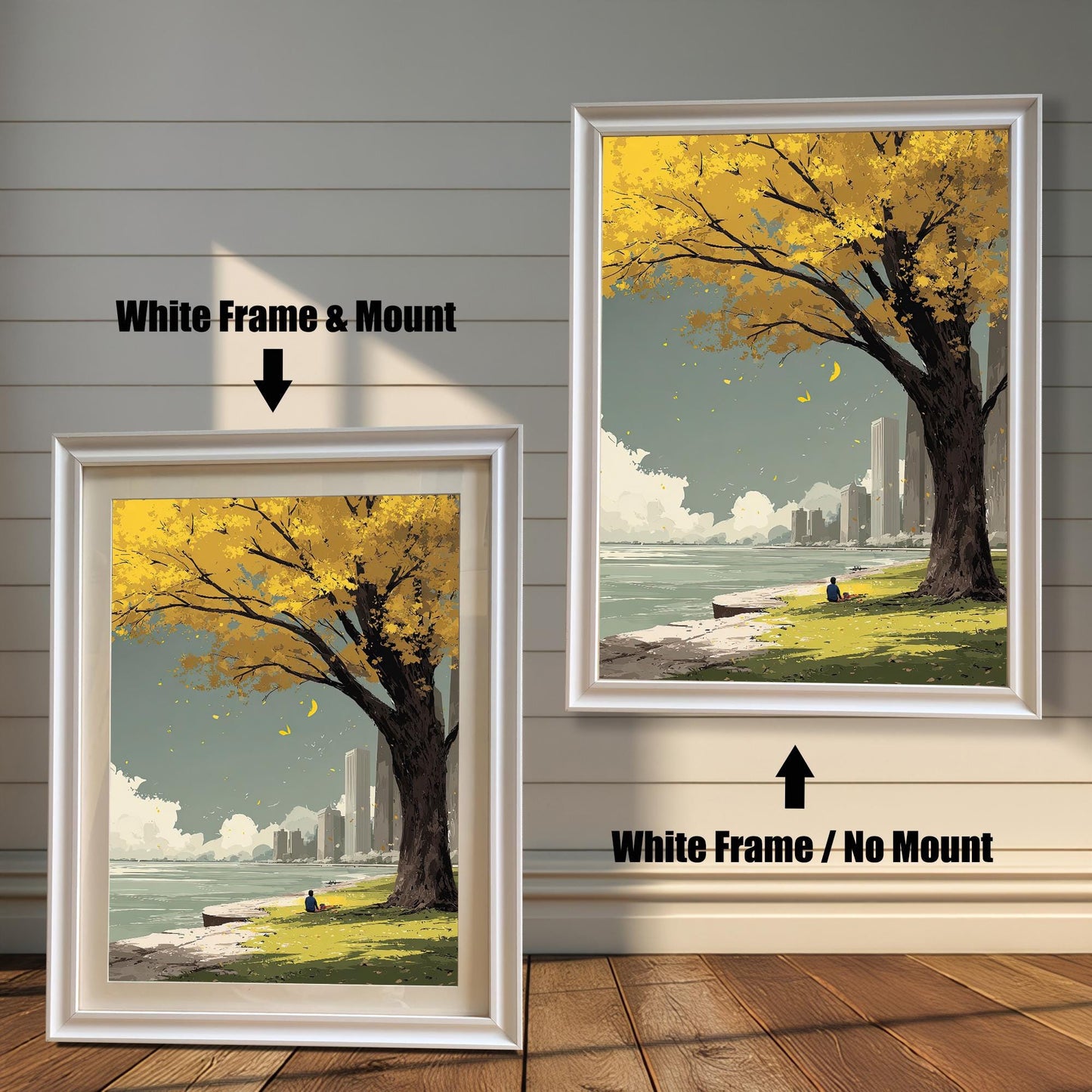 Yellow autumn tree art print comparison showing two framing options: White Frame & Mount (with a cream border) and White Frame / No Mount. The scene features a solitary figure near the water with a city skyline backdrop.