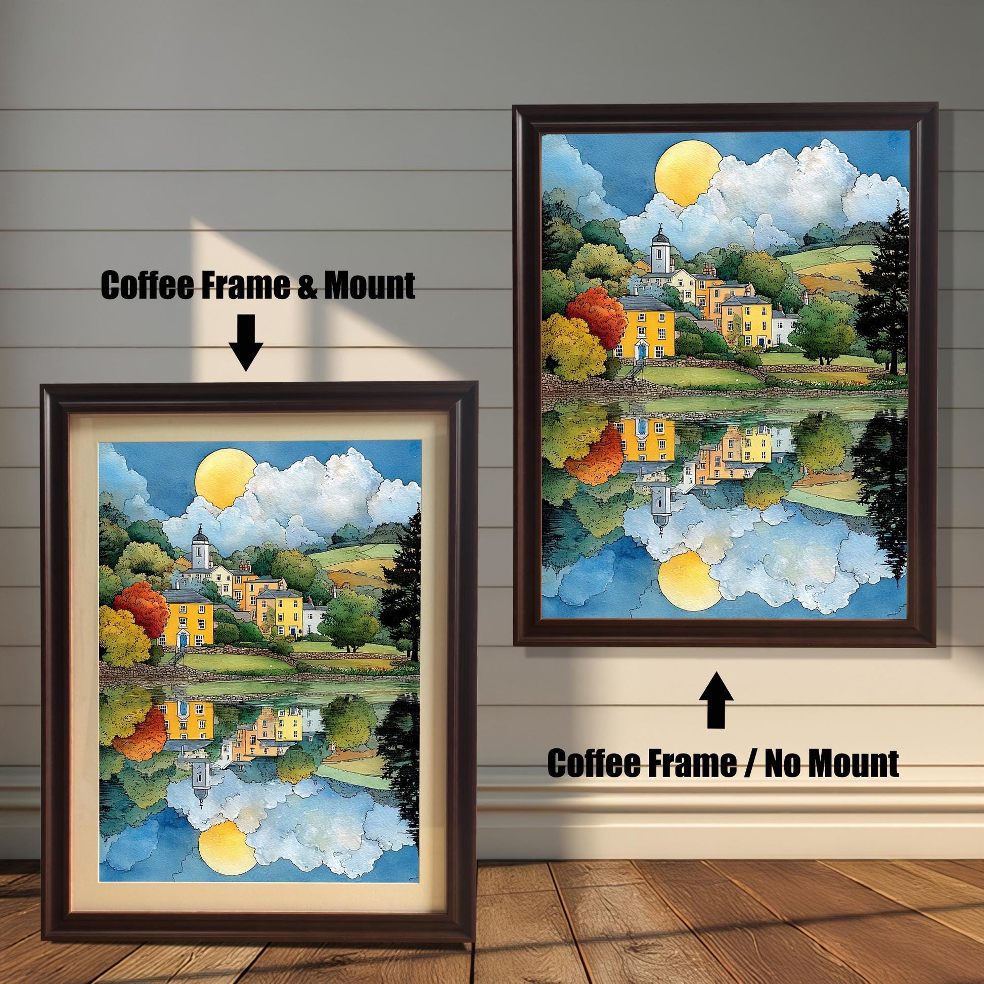 Comparison image of the framed art print. On the left, it has a Coffee Frame & Mount (matting). On the right, it has a Coffee Frame / No Mount. The art is a vibrant village with reflection.