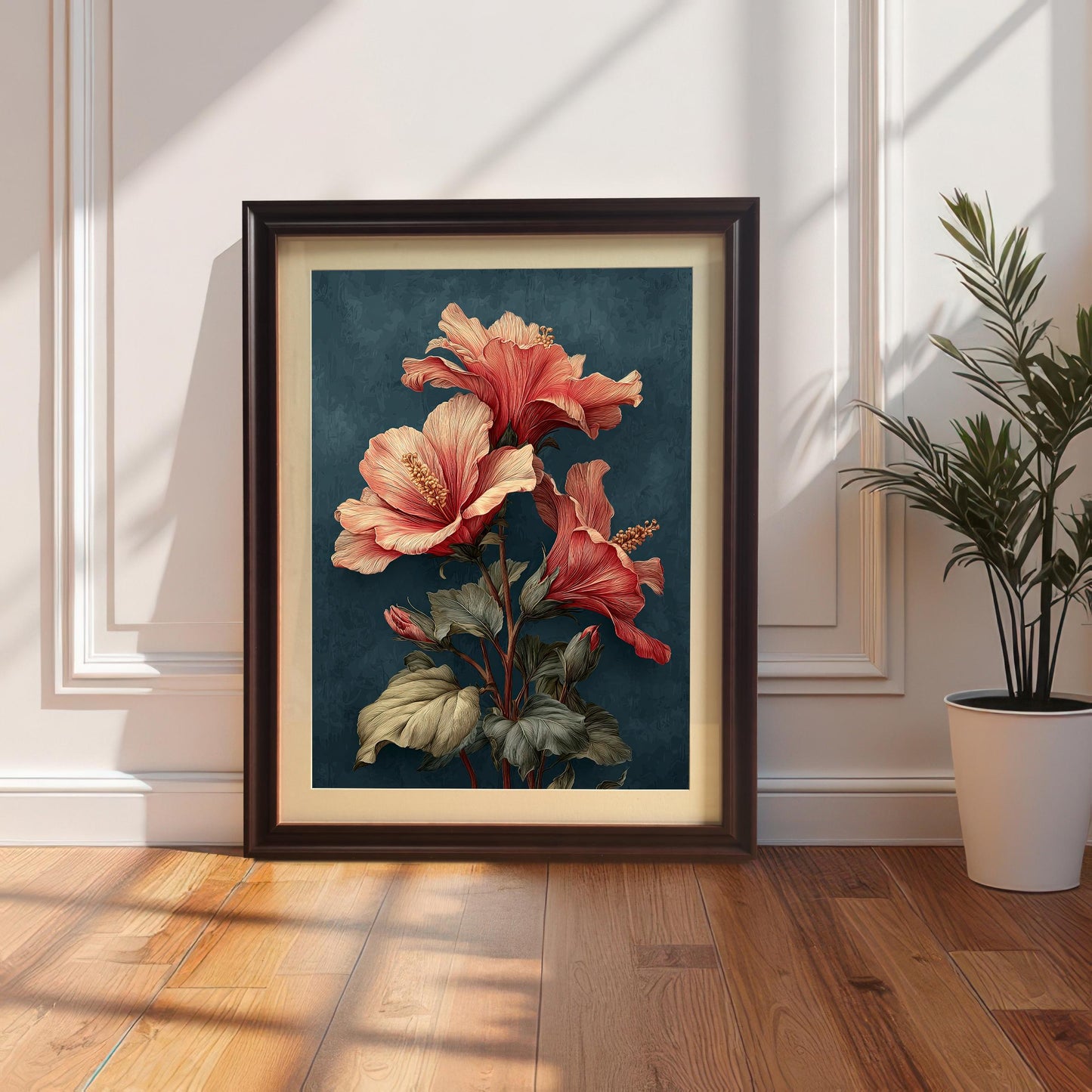 A vertically framed art print with a Coffee or Dark Brown wood frame and a mount (matting), leaning on a white wainscoted wall next to a houseplant. The art features a bold, vintage-style illustration of coral hibiscus flowers on a deep teal background