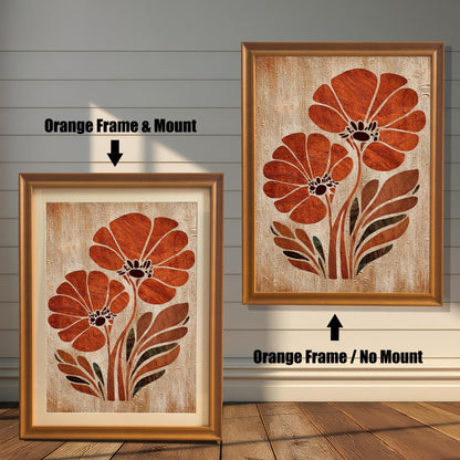 Orange flower art print framed in a bright Orange Wood Frame. Two versions are shown side-by-side on a white wood wall: one with a white mat/mount, and one without a mat/mount.