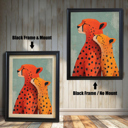 Two framed versions of the 'Cheetah Love' print against a wooden wall. On the left is the Black Frame with a light mount/matting. On the right is the Black Frame without a mount.