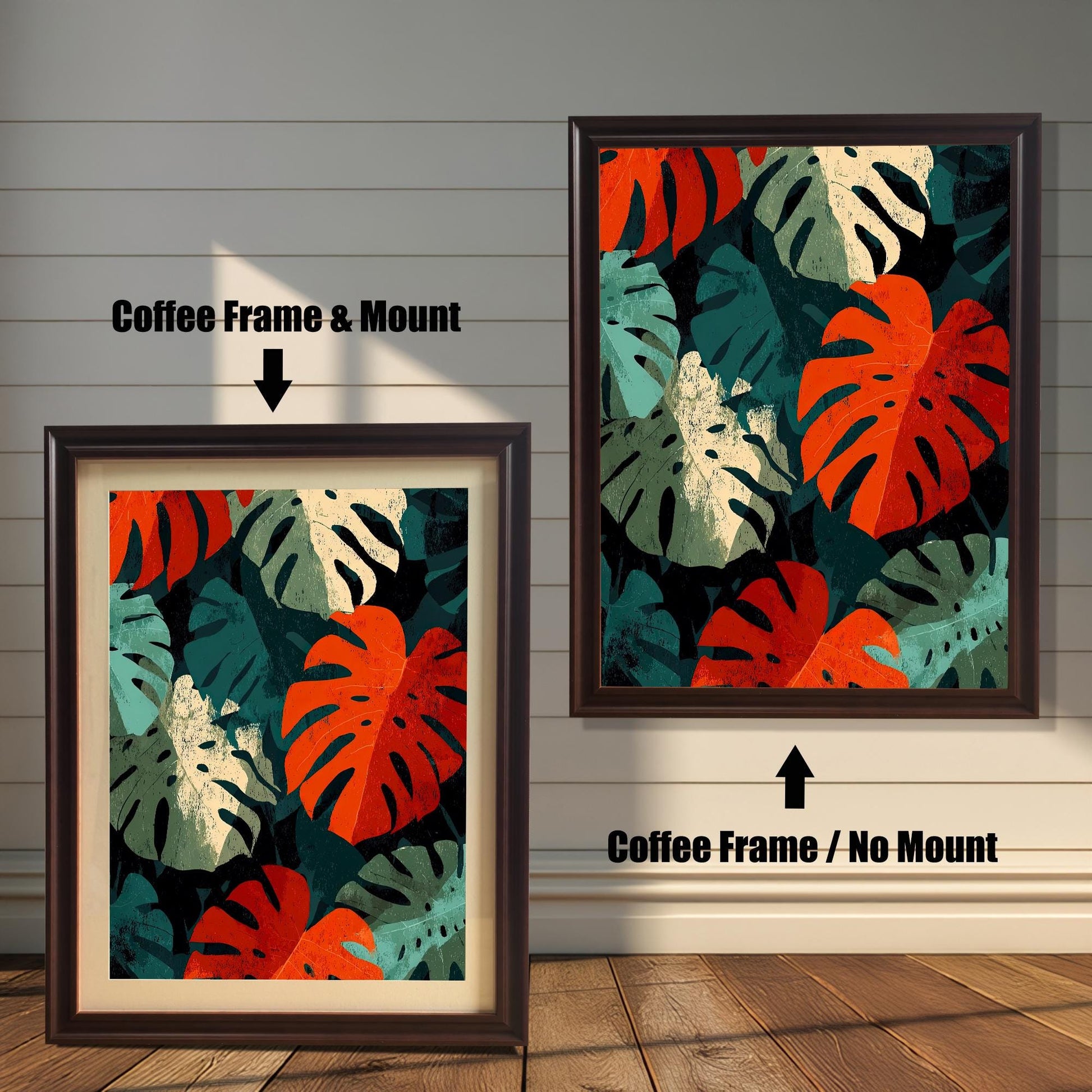 Close-up view of a framed art print featuring a repeating pattern of bold, stylized Monstera leaves in deep red, teal, cream, and dark green. The image shows two frame options: a Coffee (dark brown) colored wood frame with a mount (matting) and a Coffee wood frame with no mount around the print.