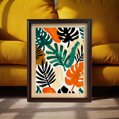 A framed art print featuring a colorful abstract tropical leaf pattern, framed in Coffee Wood (dark brown) with a Mount (matting). The framed art is leaning on a light wood floor, set against a bright yellow sofa/cushions.