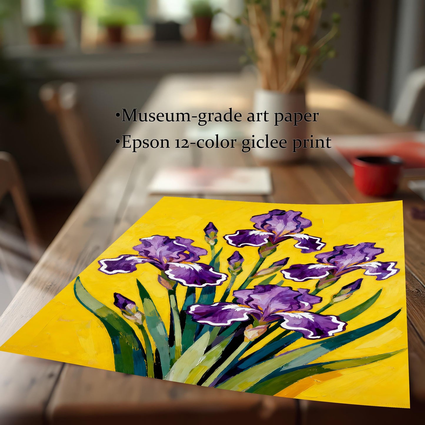 Close-up of an unframed, loose print featuring the painting of purple Irises on yellow, resting on a wooden table. Text highlights print quality: Museum-grade art paper and Epson 12-color giclee print.