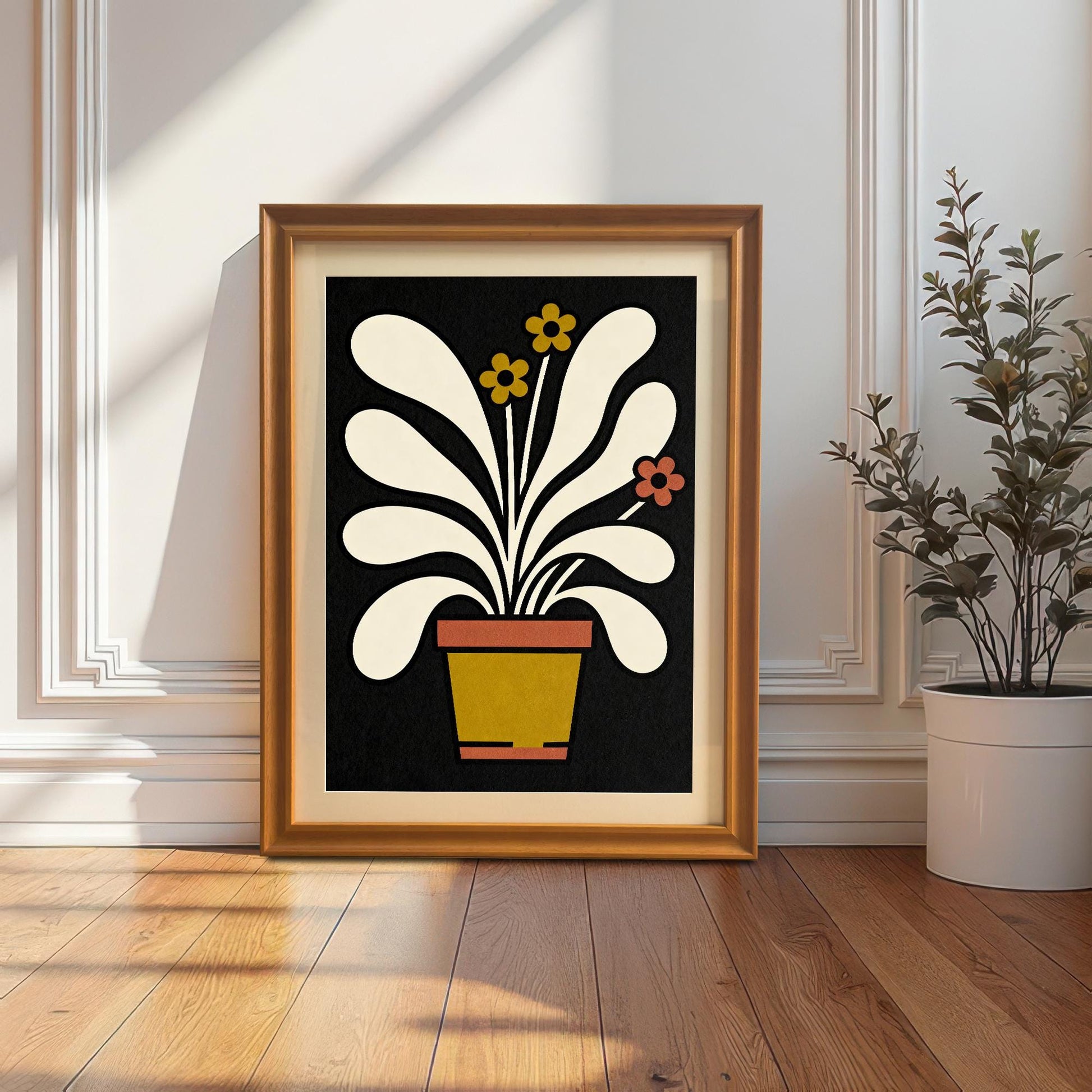 Full-view mock-up of the abstract potted plant art print in a Natural/Orange Wood frame, leaning against a white wainscoting wall on a wooden floor.