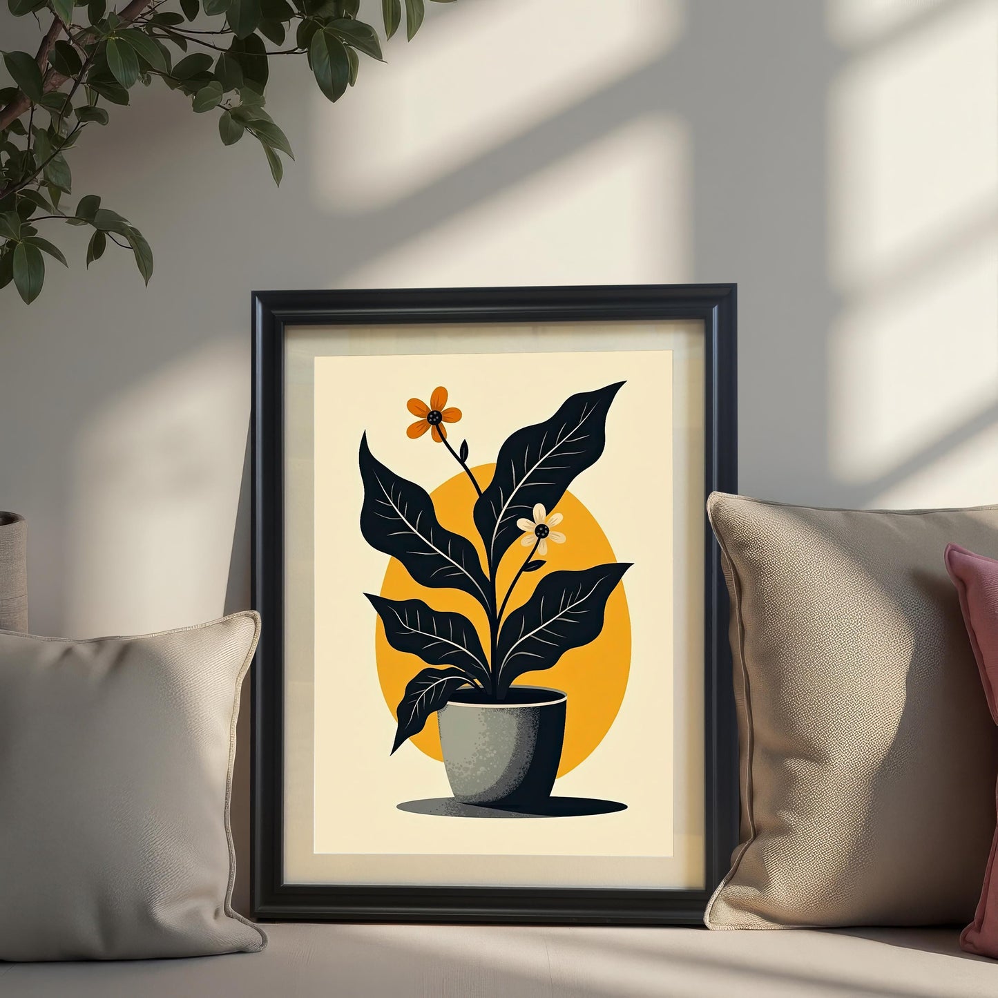 Mock-up of the abstract potted plant art print in a Black wood frame, propped up on a couch or windowsill between two neutral-colored throw pillows, with sunlight casting shadows.