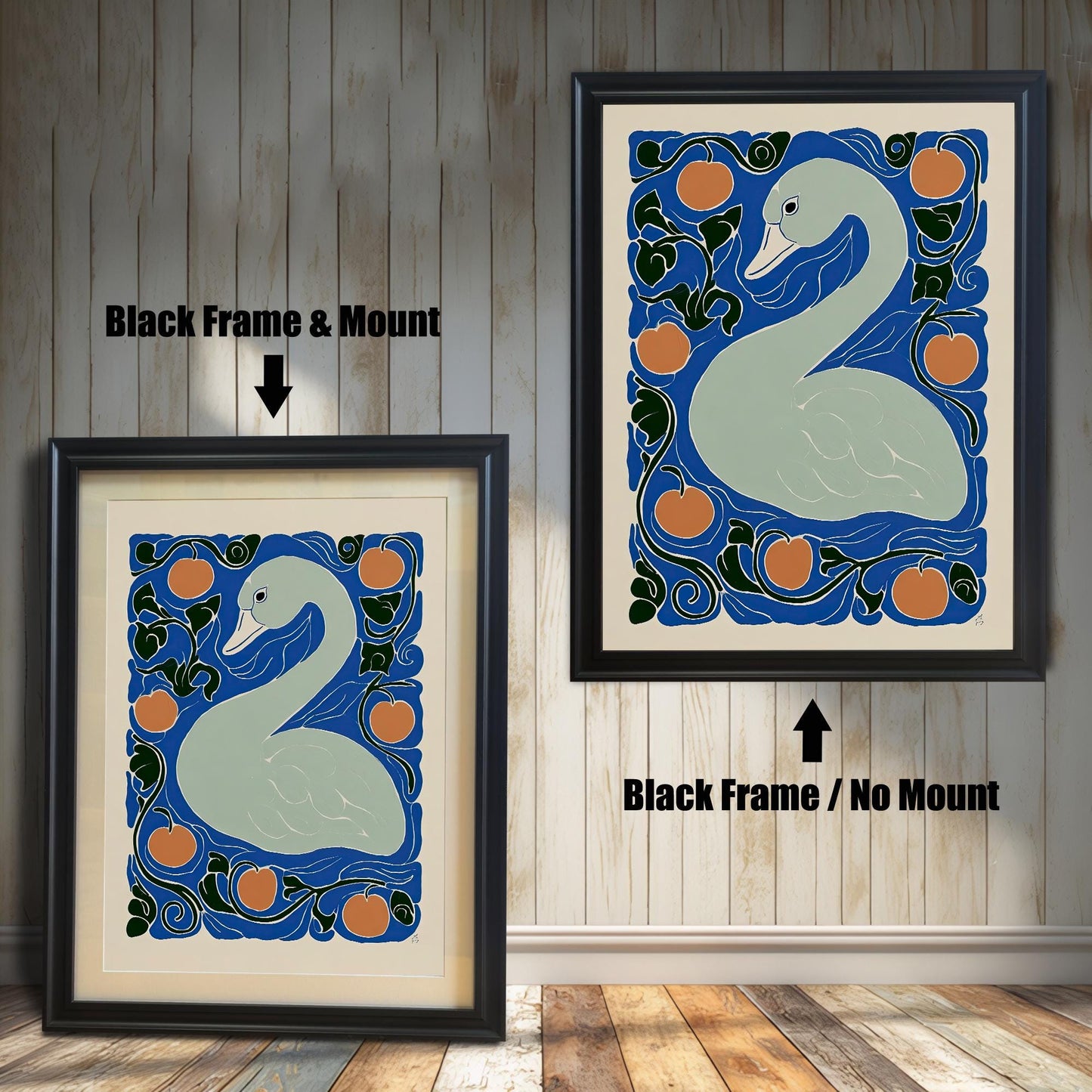 Two framed prints of the swan artwork against a wooden plank wall. The print on the left is a Black Frame & Mount, showing a white border (mount) around the art. The print on the right is a Black Frame / No Mount, where the art fills the frame.
