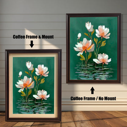 Abstract watercolor-style painting of white and pale orange water lilies on a dark green background. The image shows two framed options: one on the left with a Coffee Frame & Mount (matting), and one on the right with a Coffee Frame / No Mount. Both are displayed against a white wood-paneled wall and a wooden floor.