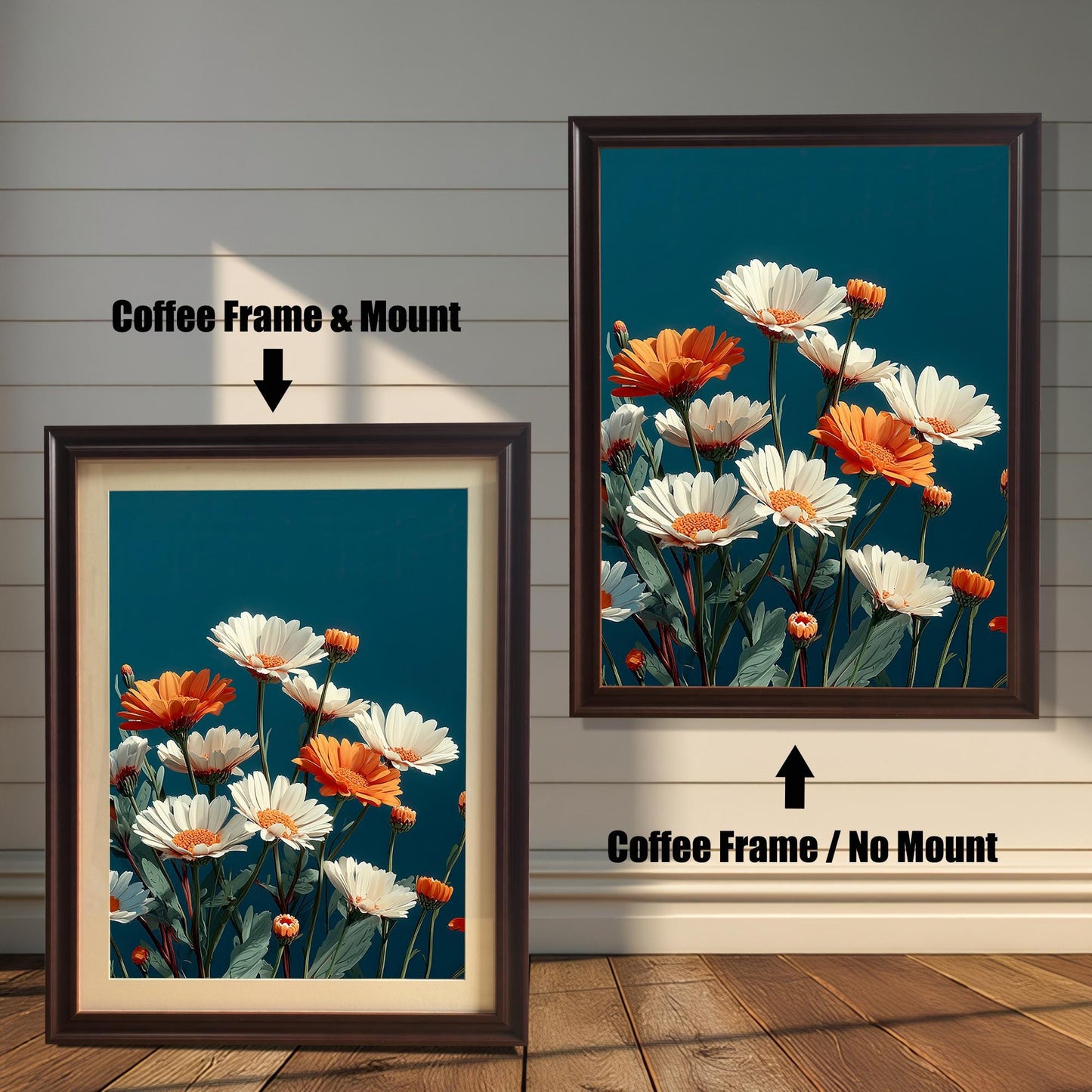 Abstract painting of white and orange daisies on a dark teal background. The image shows two framed options: one on the left with a Coffee Frame & Mount (matting), and one on the right with a Coffee Frame / No Mount. Both are displayed against a white wood-paneled wall and a wooden floor.