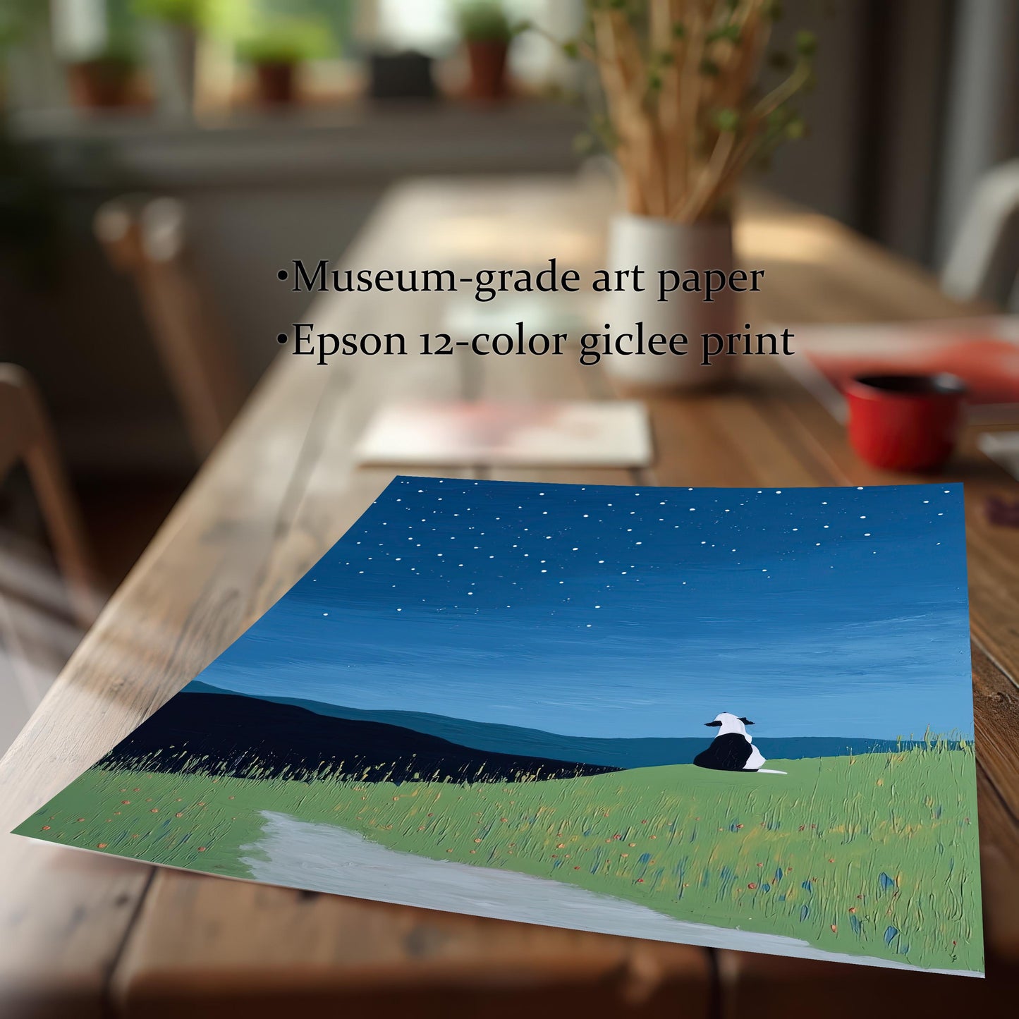 Close-up of an unframed print of the starry night dog artwork lying on a wooden table. Text overlay reads: "Museum-grade art paper" and "Epson 12-color giclee print," emphasizing the print quality.