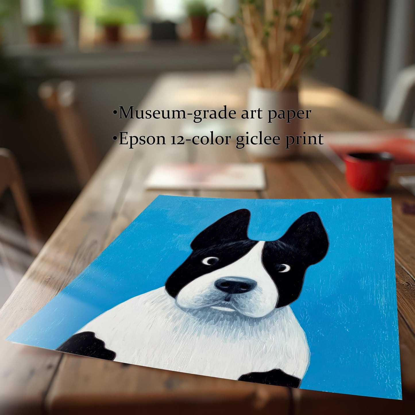 Close-up of an unframed print of the black and white dog artwork lying on a wooden table. Text overlay reads: "Museum-grade art paper" and "Epson 12-color giclee print," highlighting the print quality.
