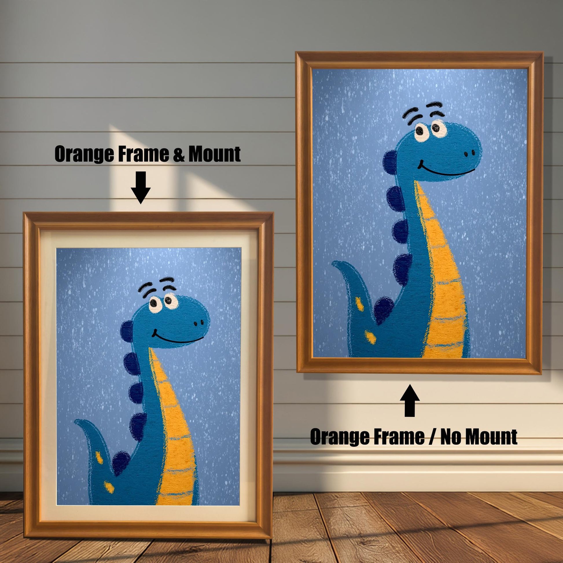 Comparison photo showing the dinosaur art print in orange (light brown) frames with and without a light-colored mat (mount). Arrows indicate "Orange Frame & Mount" (left) and "Orange Frame / No Mount" (right).