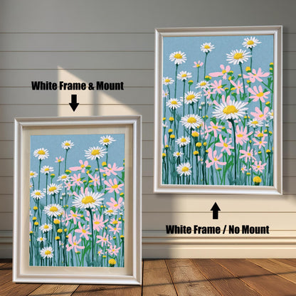 A framed art print of the daisy field illustration, shown in two options with a White Frame: one on the right with No Mount, and one on the left with a Mount (a light-colored mat).