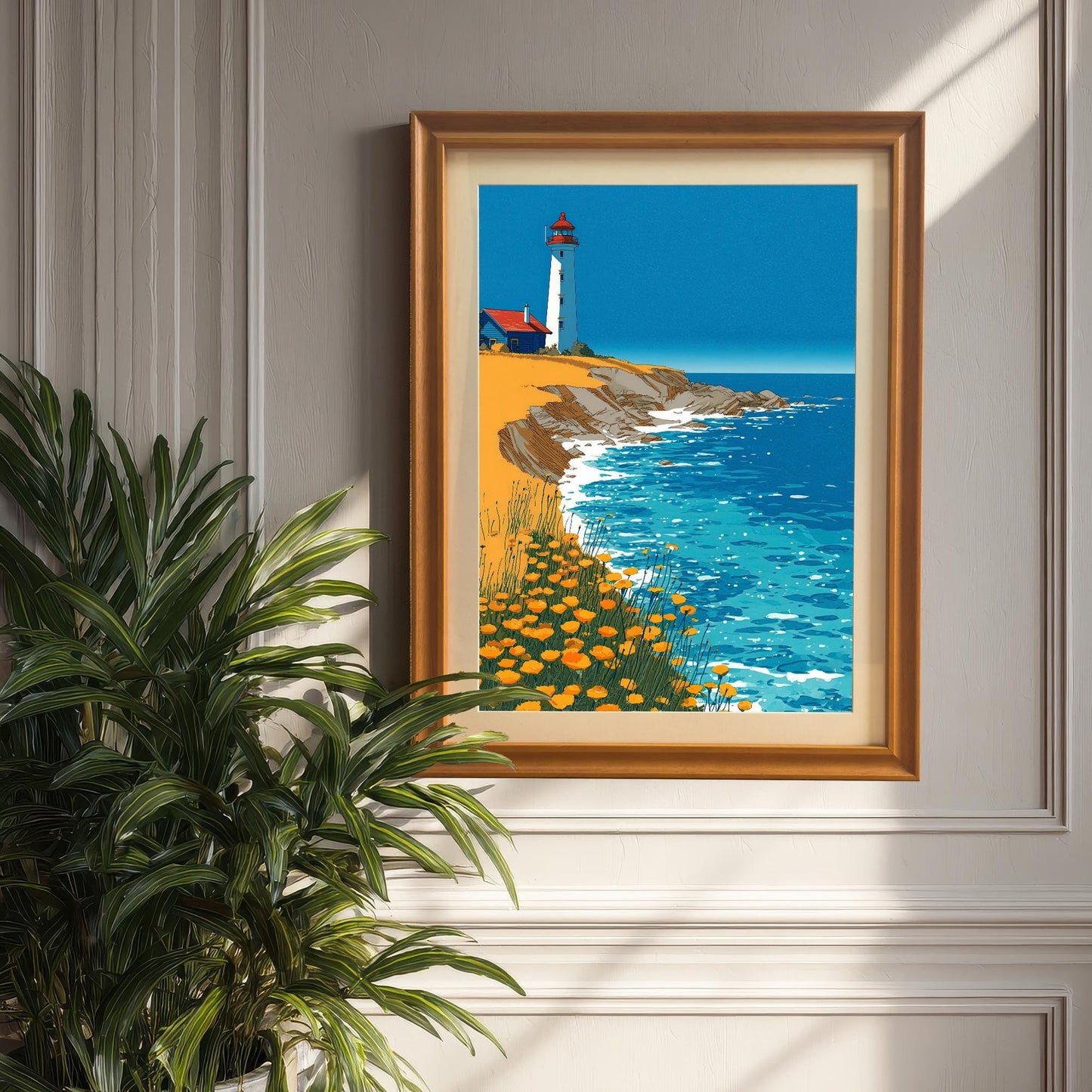 A framed print of the lighthouse illustration, set in an Orange/Wood frame with a mat, hanging on a paneled wall next to a large green houseplant.