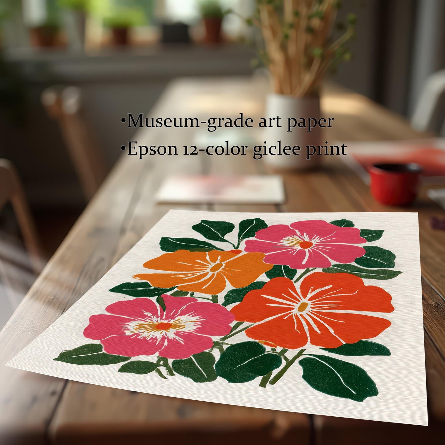A flat, brightly colored botanical print featuring four flowers—two pink and two orange/red—and green leaves, lying on a wooden table. Text overlays read: "Museum-grade art paper" and "Epson 12-color giclee print."