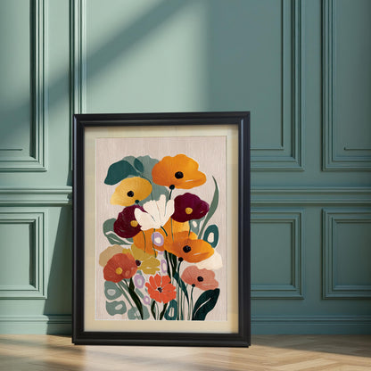 Abstract floral art print in a black frame with a white mat/mount leaning on a wooden floor against a teal/green wainscoted wall. Sunlight casts a diagonal shadow across the wall and the frame.