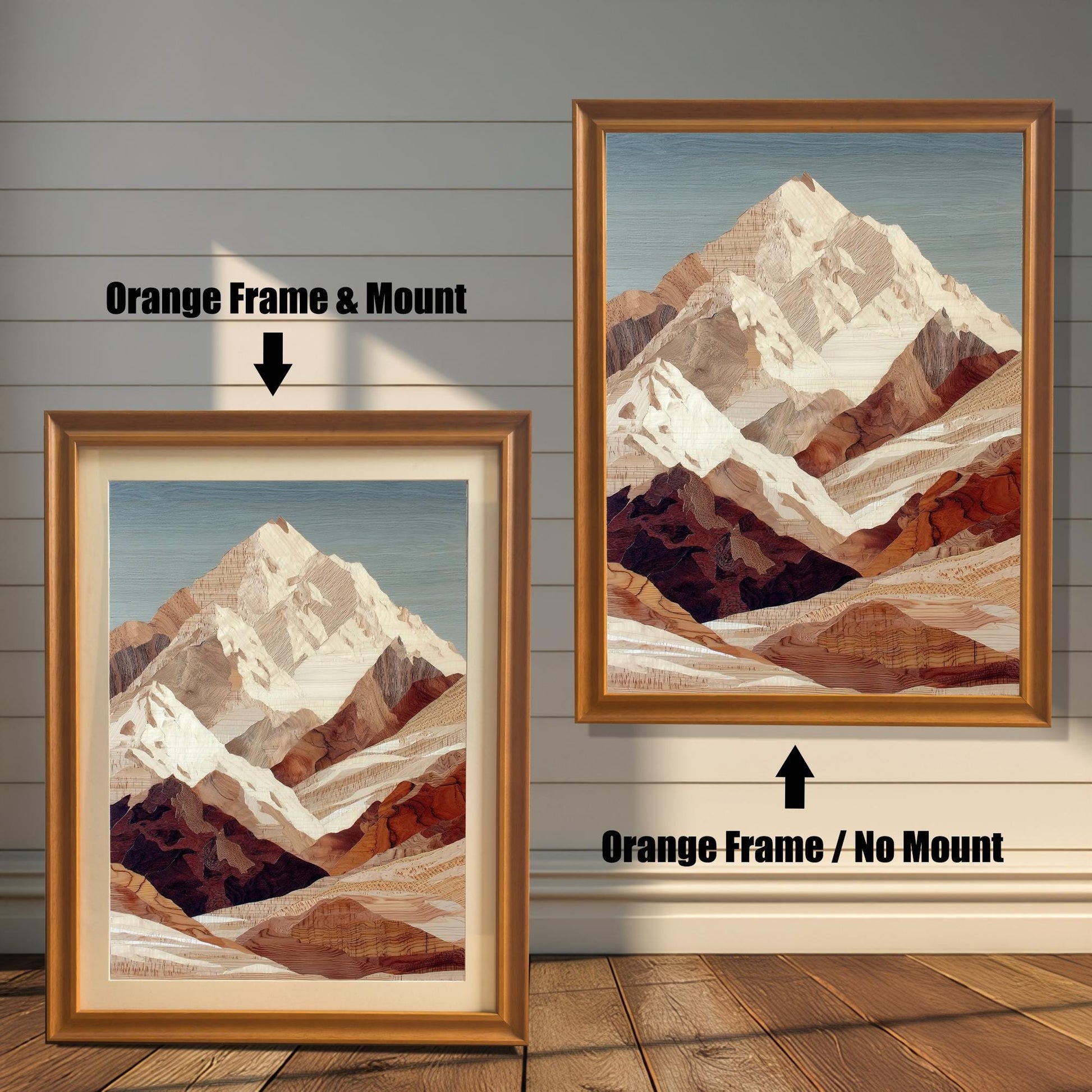 Comparison image showing two framed prints of the mountain art against a white wooden-paneled wall. The left print has an Orange frame and a light mount (matting), labeled "Orange Frame & Mount." The right print has an Orange frame with no mount, labeled "Orange Frame / No Mount."