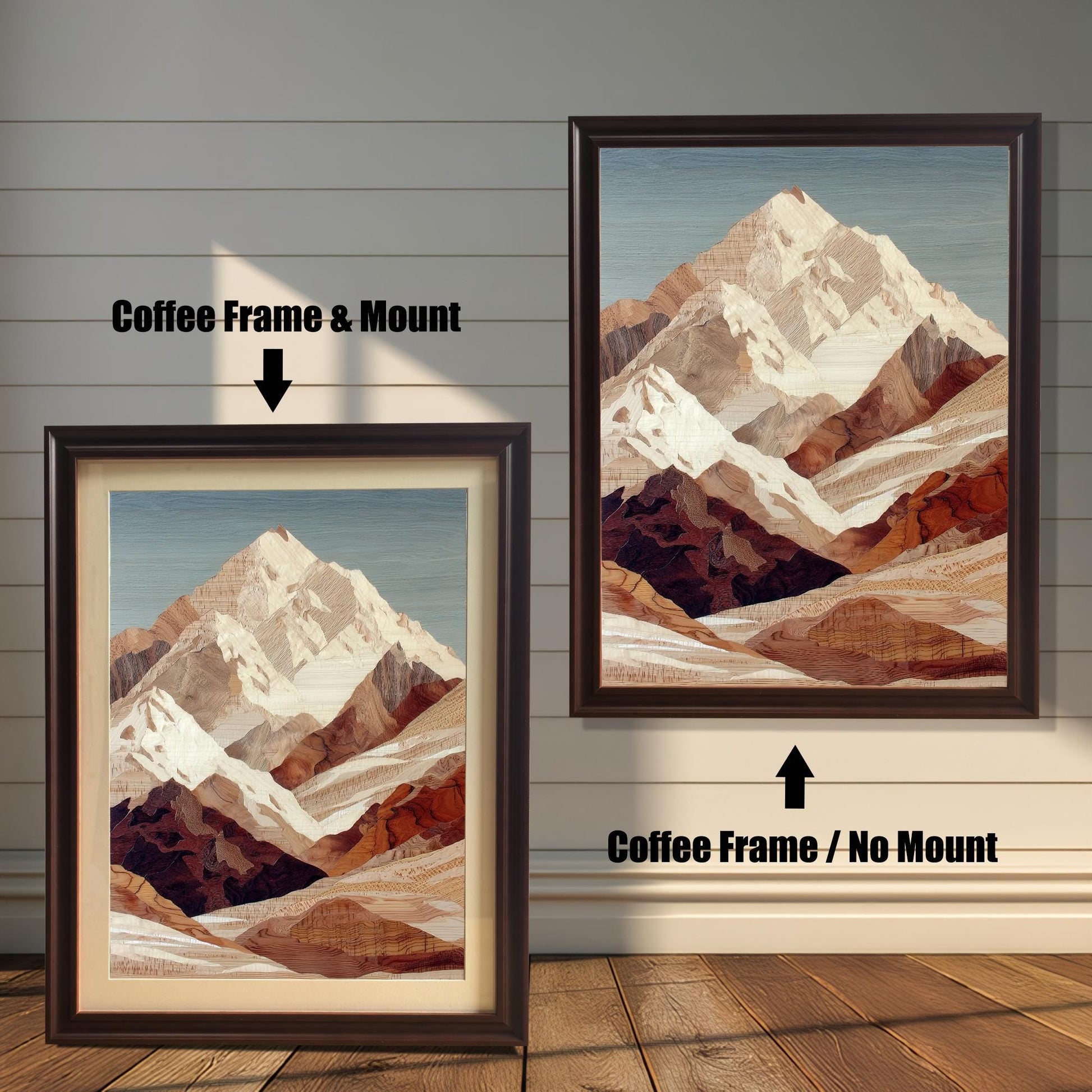 Comparison image showing two framed prints of the mountain art against a white wooden-paneled wall. The left print has a Coffee-colored (dark brown) frame and a light-colored mount (matting), labeled "Coffee Frame & Mount." The right print has a Coffee frame with no mount, labeled "Coffee Frame / No Mount."