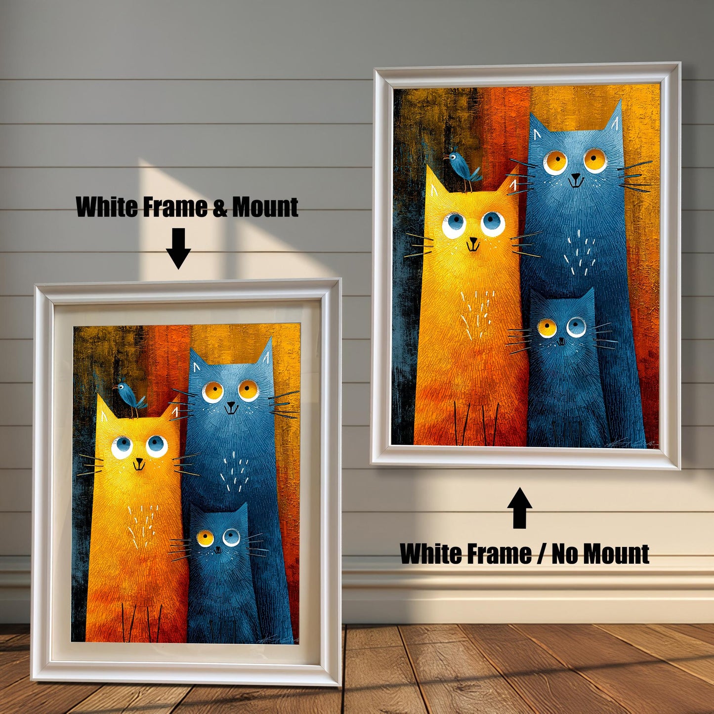 Comparison image showing two framed prints of the cat art against a white wooden-paneled wall. The left print has a White frame and a white mount (matting), labeled "White Frame & Mount." The right print has a White frame with no mount, labeled "White Frame / No Mount."