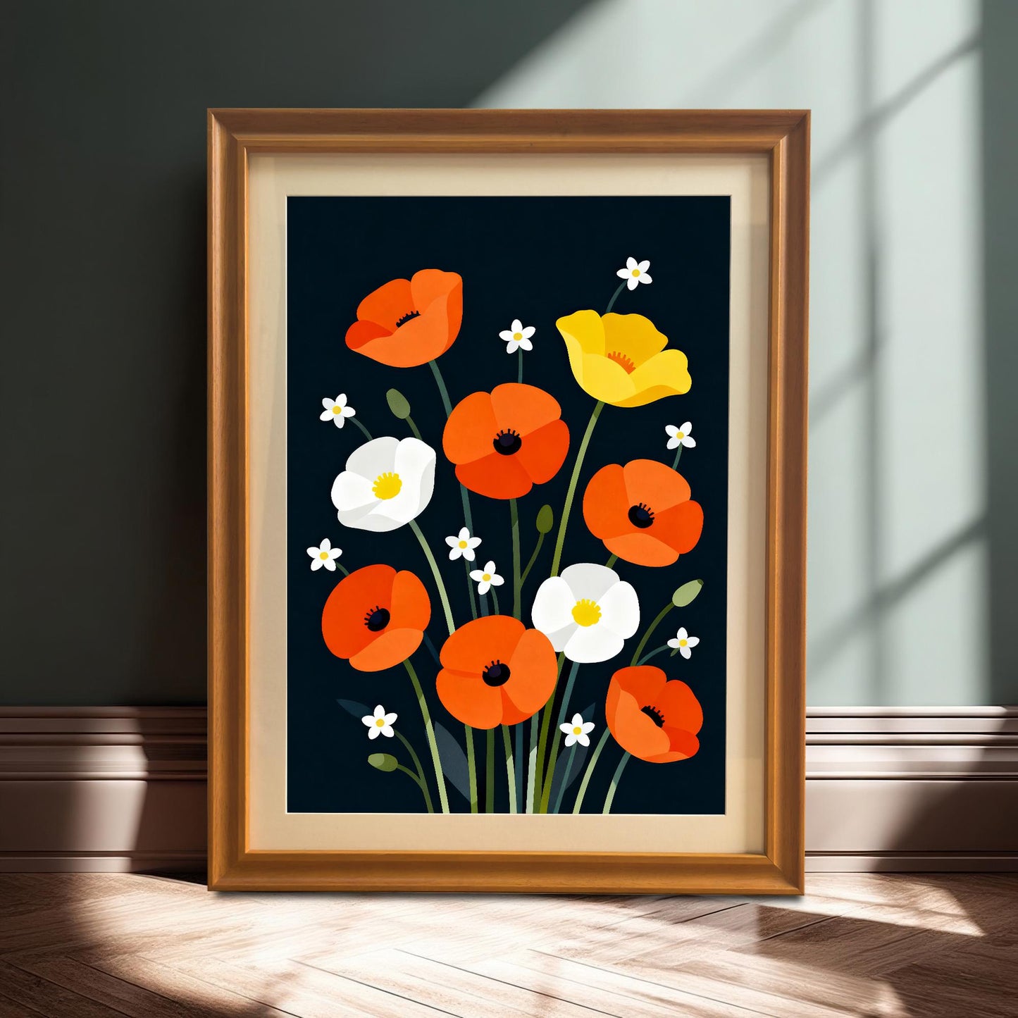 The framed poppy art print in an Orange/light-brown wooden frame with a mount is leaning on a hardwood floor against a dark green or gray wall, highlighting the colors of the art.