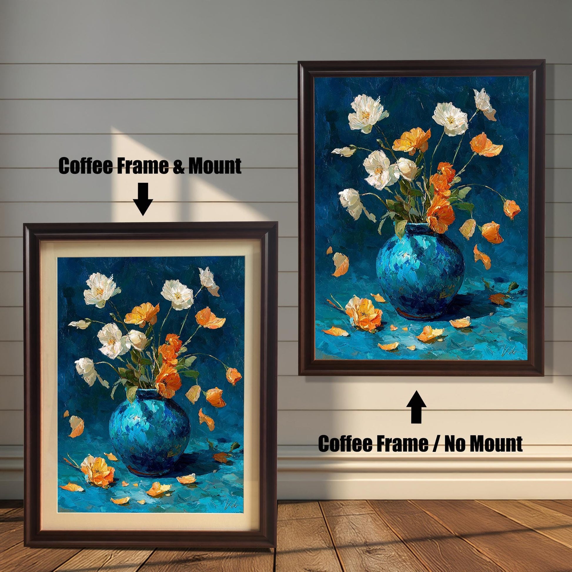 Two versions of the oil painting featuring white and orange flowers in a blue vase, set against a distressed white wood wall: one on the left in a Coffee Frame & Mount (with a light-colored border), and one on the right in a Coffee Frame / No Mount (without a border).