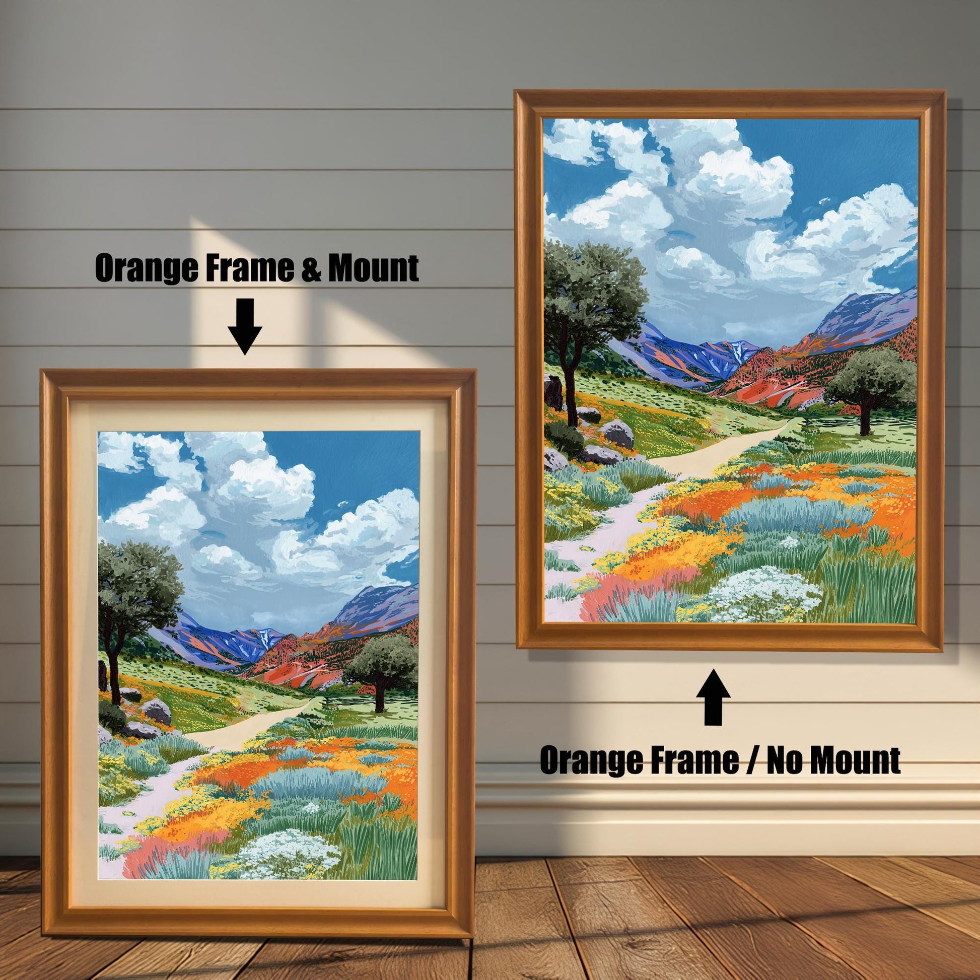 A colorful painting of a path through a valley of orange and yellow wildflowers, shown in an Orange wood frame. The smaller image (left) includes a mount (mat), and the larger image (right) is framed without a mount.
