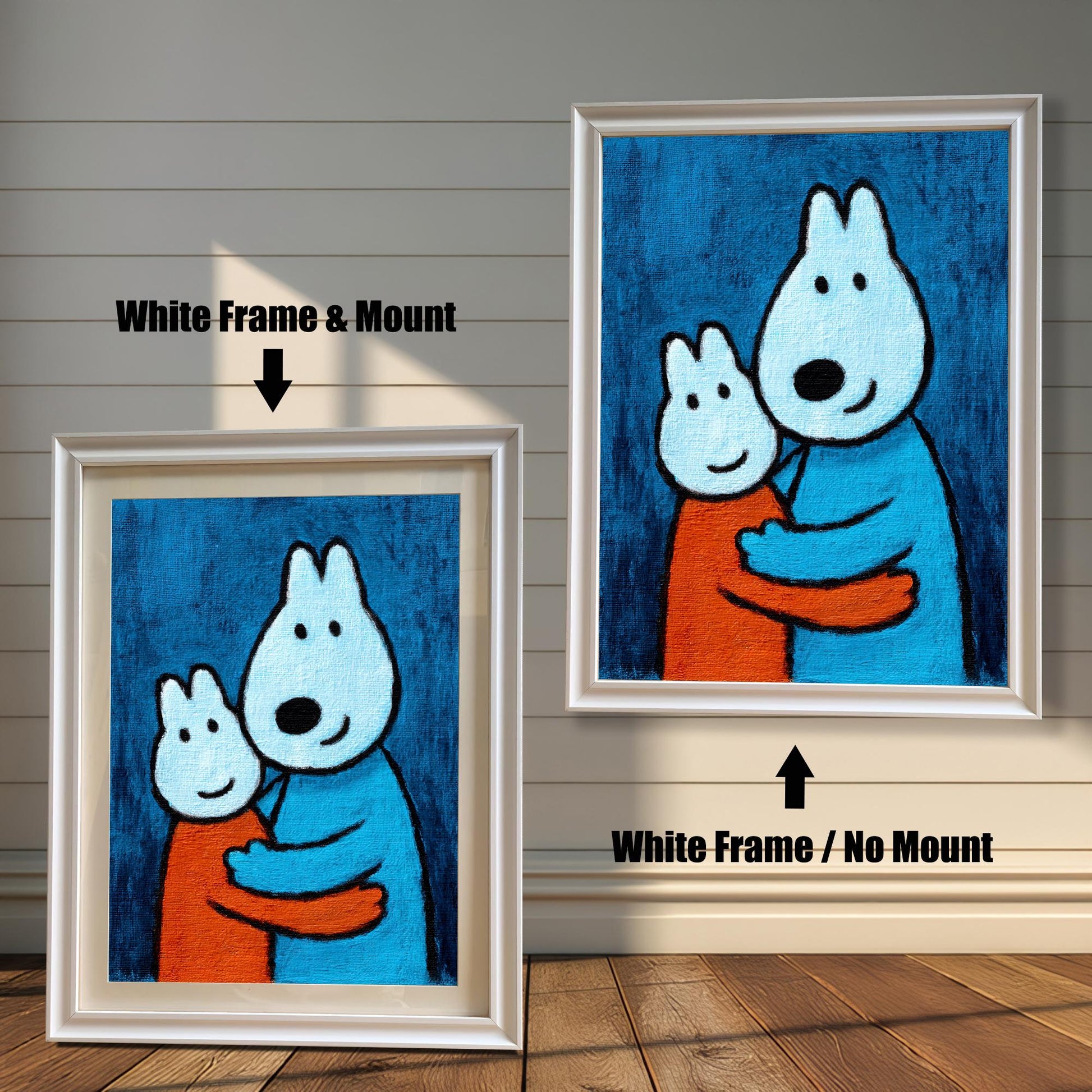 Comparison of a White wood frame with a cream mount (mat) on the left, and a White wood frame without a mount on the right, both featuring the print of two hugging cartoon animals.
