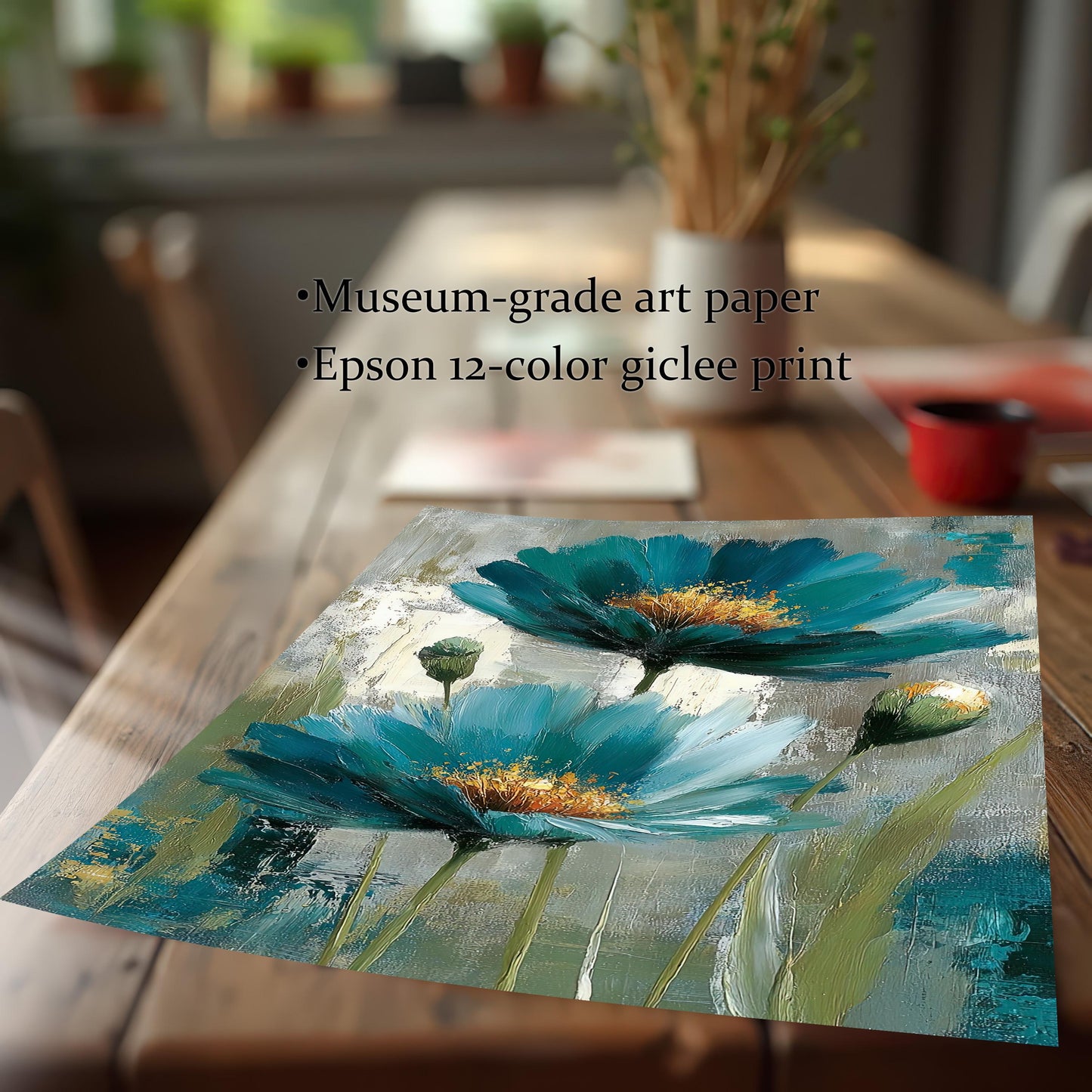 A loose art print without a frame placed on a wooden table. Text highlights the print quality: "Museum-grade art paper" and "Epson 12-color giclee print." The print is an abstract painting of two large teal or turquoise flowers with yellow centers.