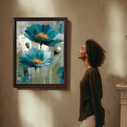 A woman in a striped shirt looks up at a framed art print hanging on a textured wall. The print is in a Coffee-colored wood frame with a mount and features the abstract teal and blue floral painting.