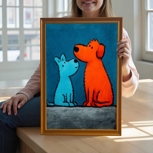 A smiling person holding the framed pop art print of the blue and orange dogs in an Orange Frame (or Gold Tone Frame) up close, sitting in front of a window.