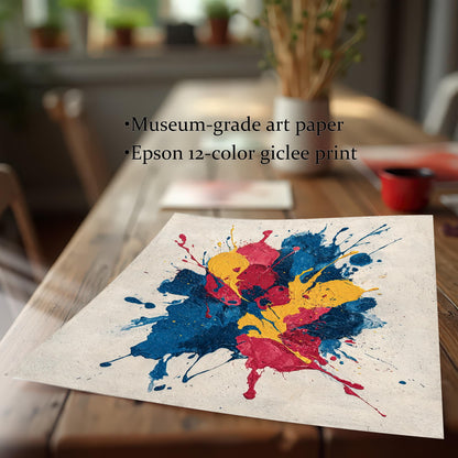 A close-up, angled shot of the abstract paint splatter art print on a wooden table. Text describes the quality as Museum-grade art paper and an Epson 12-color giclee print.