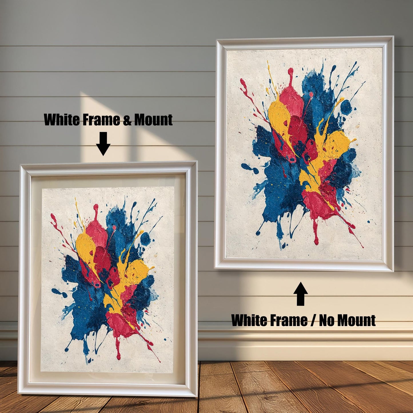 Abstract paint splatter art print shown in two variations with a White Frame: on the left, with a Mount/Mat; on the right, with No Mount (full image). Both are against a light wood-paneled wall.