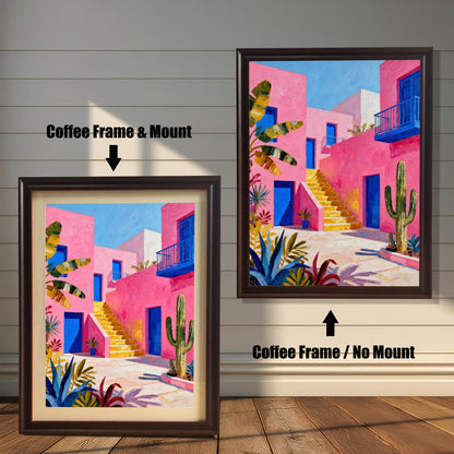 Two framed versions of a bright pink building painting with blue doors and yellow stairs. The left is a "Coffee Frame & Mount" (with matting); the right is a "Coffee Frame / No Mount" (no matting).