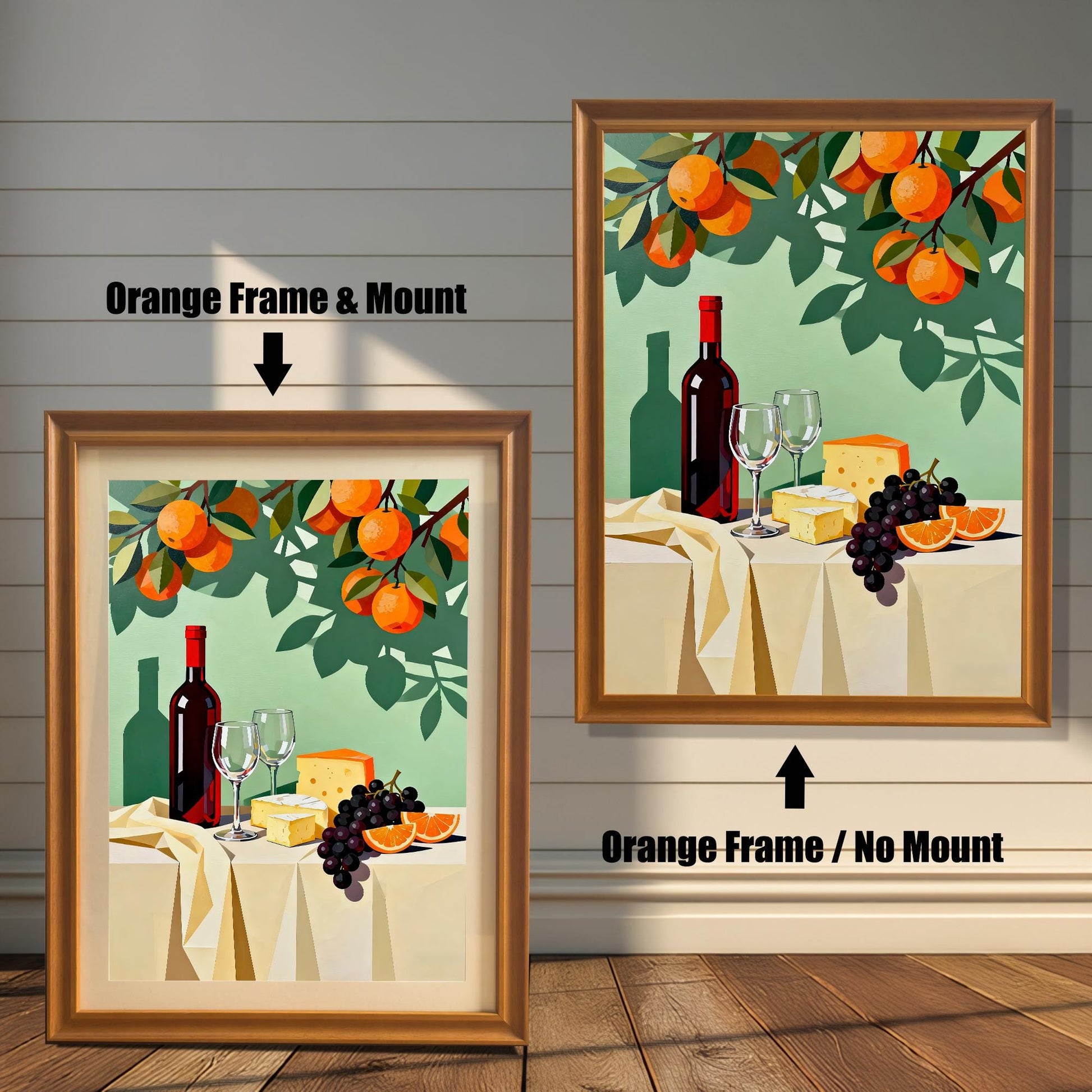 Modern still life art print featuring a wine bottle, glasses, cheese, grapes, and oranges. Shown in two framed options: an Orange Frame with a Mount (lighter border/mat) on the left, and an Orange Frame with No Mount on the right.