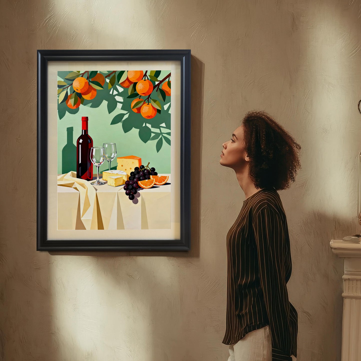 Styled photo of the still life art print in a Black frame with no mount, hanging on a textured wall, with a woman standing to the side admiring the artwork.