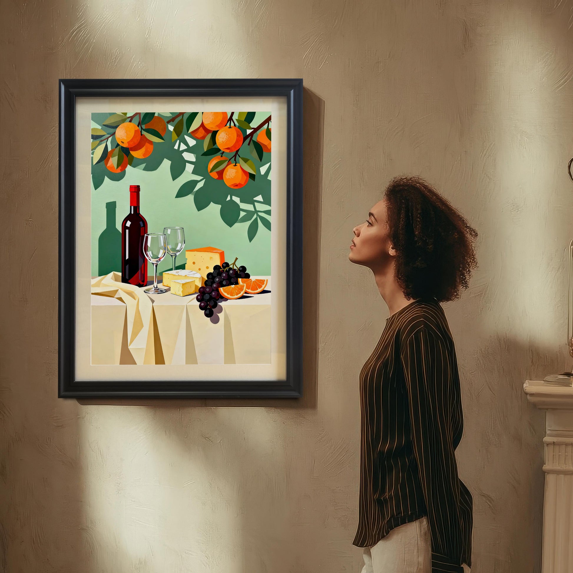 Styled photo of the still life art print in a Black frame with no mount, hanging on a textured wall, with a woman standing to the side admiring the artwork.