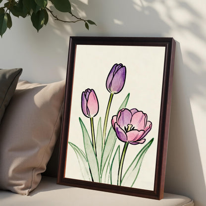 Close-up lifestyle photo showing the framed tulip art print in a dark (Coffee) frame, leaning on a cushion next to a pillow with foliage hanging above.