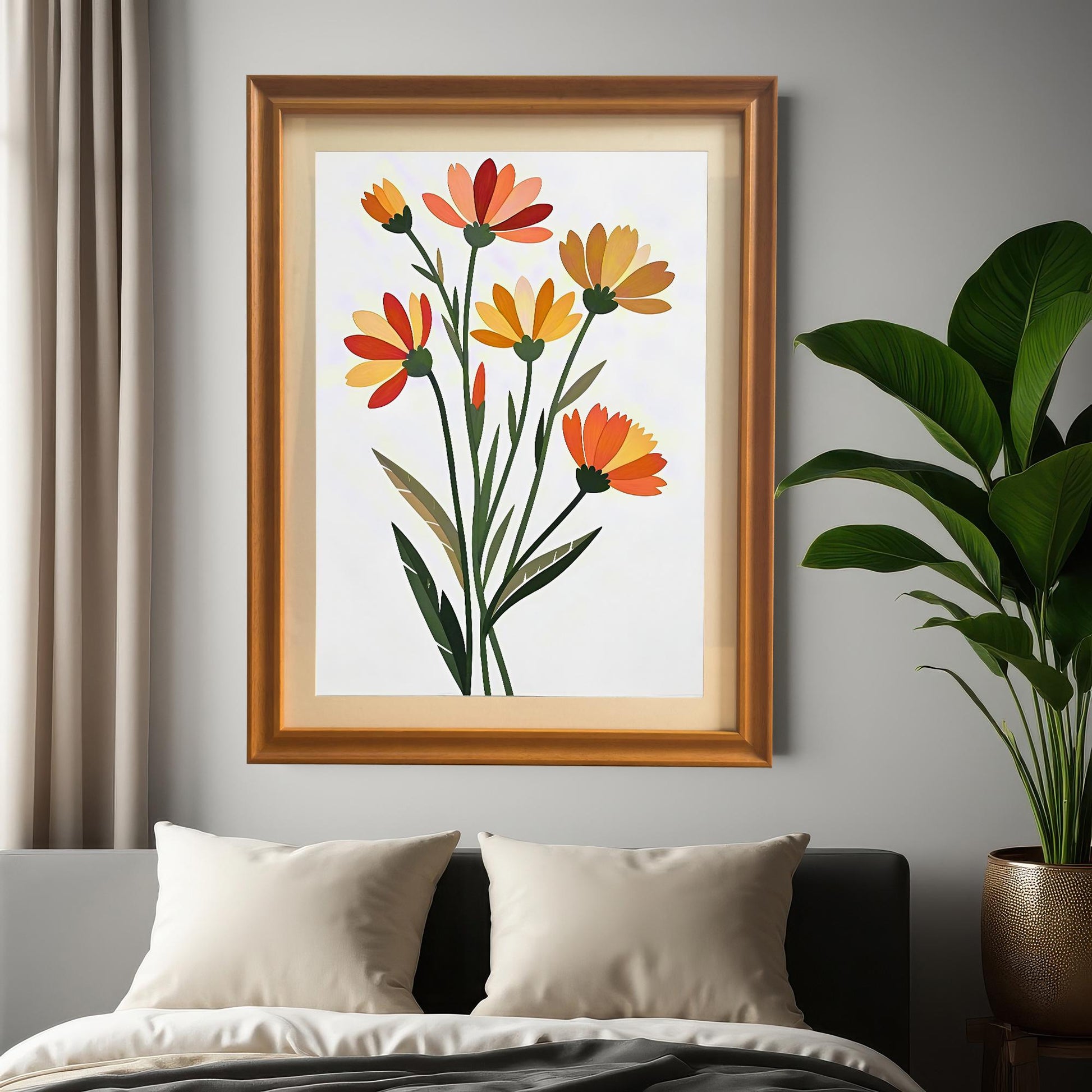 Lifestyle photo showing the framed floral art print hung above a bed with white pillows and a gray comforter. The print is in an Orange wood-colored frame with a mat/mount. A large potted plant is visible on the right.